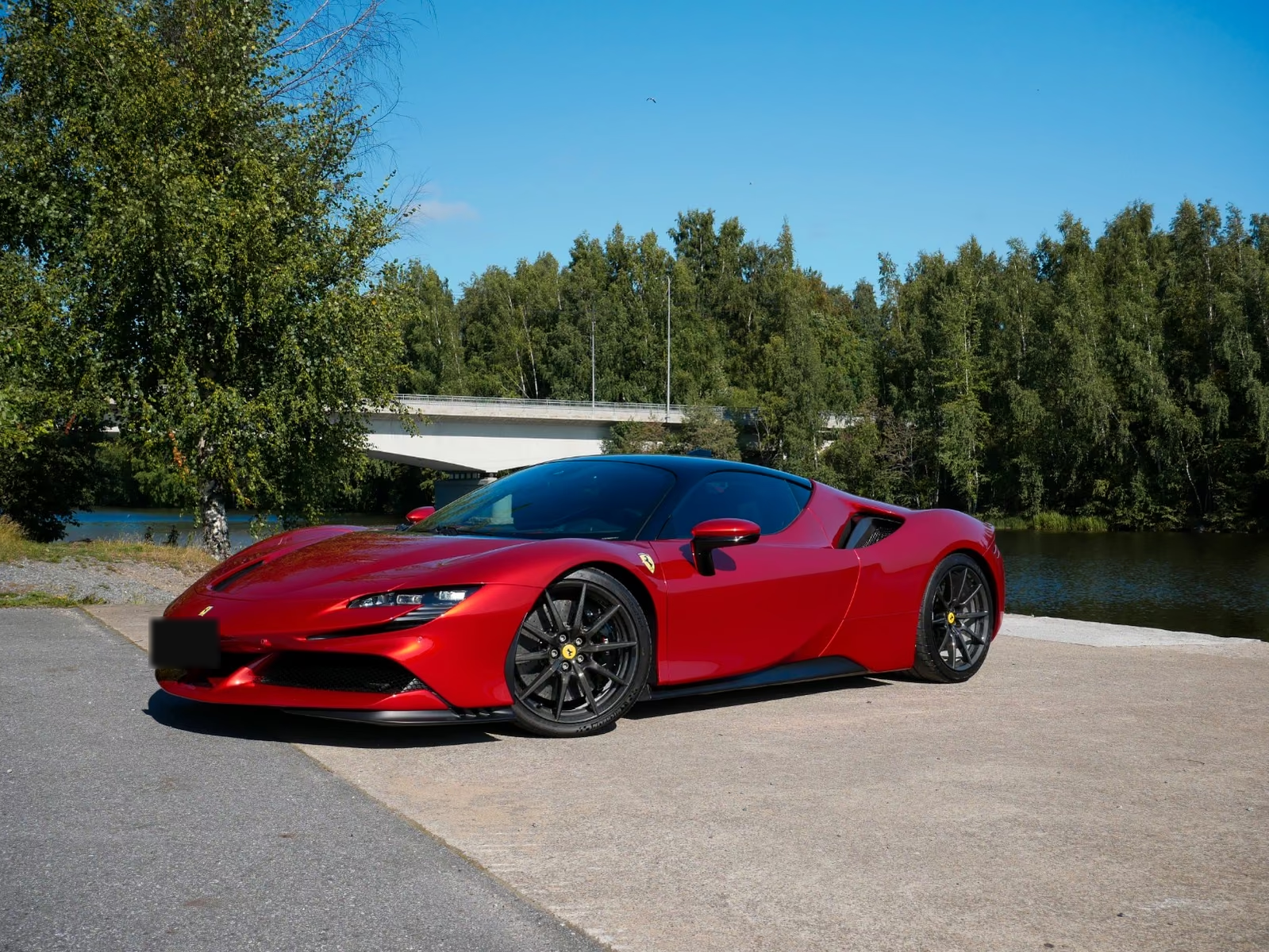 Ferrari SF90 Stradale 2022 in Rosso Magma — front three-quarter view