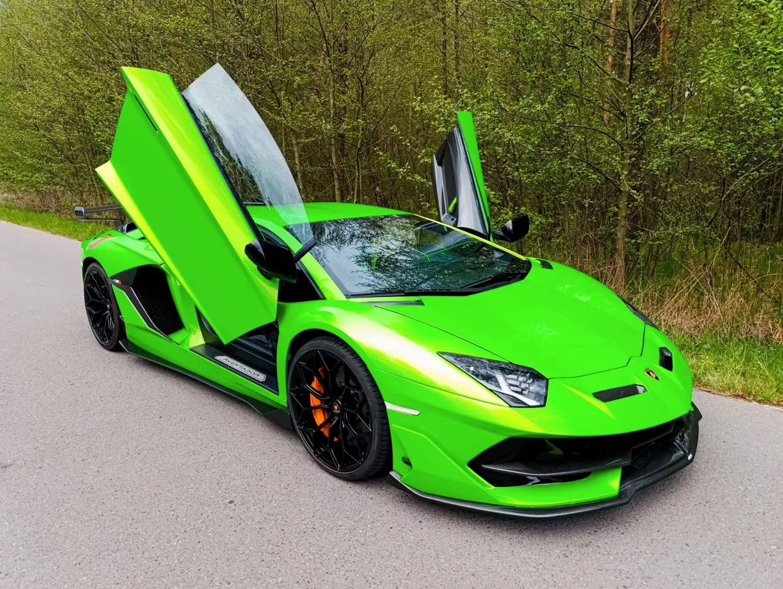 Lamborghini Aventador SVJ 2014 — front three-quarter view with scissor doors raised