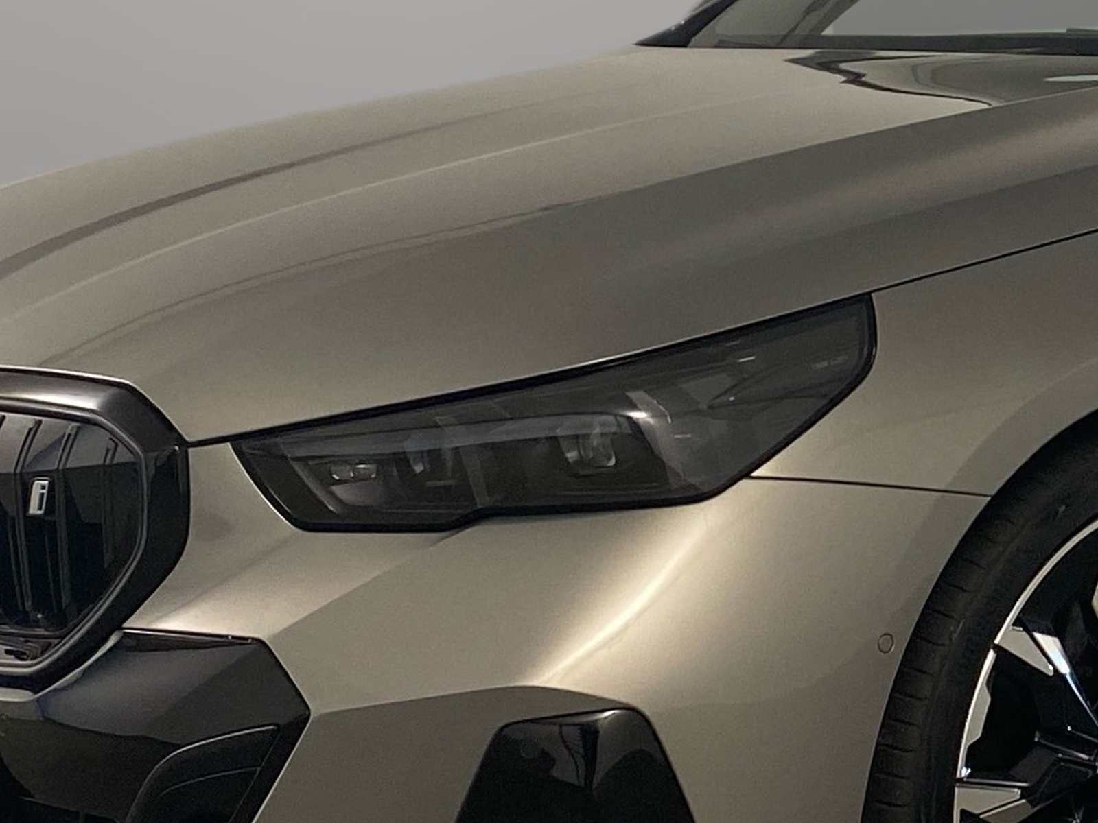 Close-up of the adaptive LED headlight on the BMW i5.