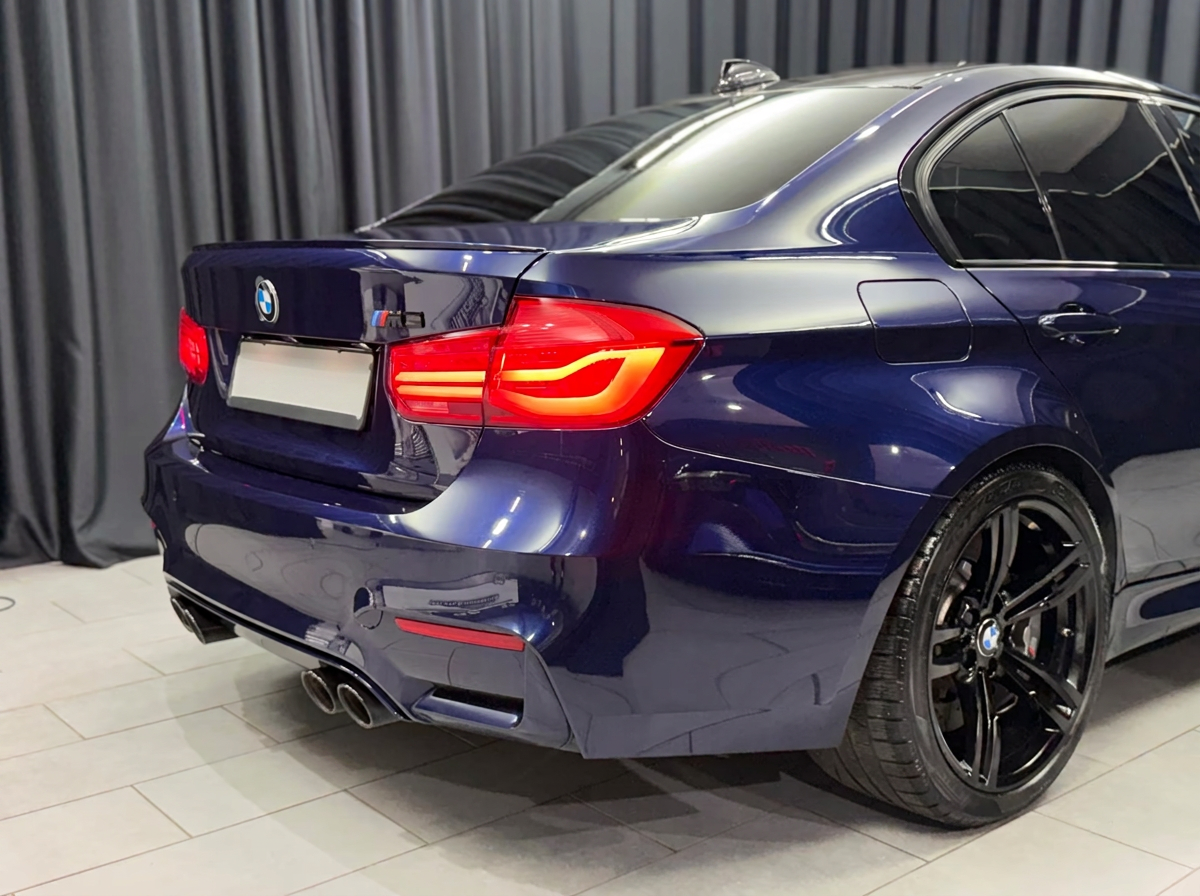BMW M3 Competition F80 — rear three-quarter view