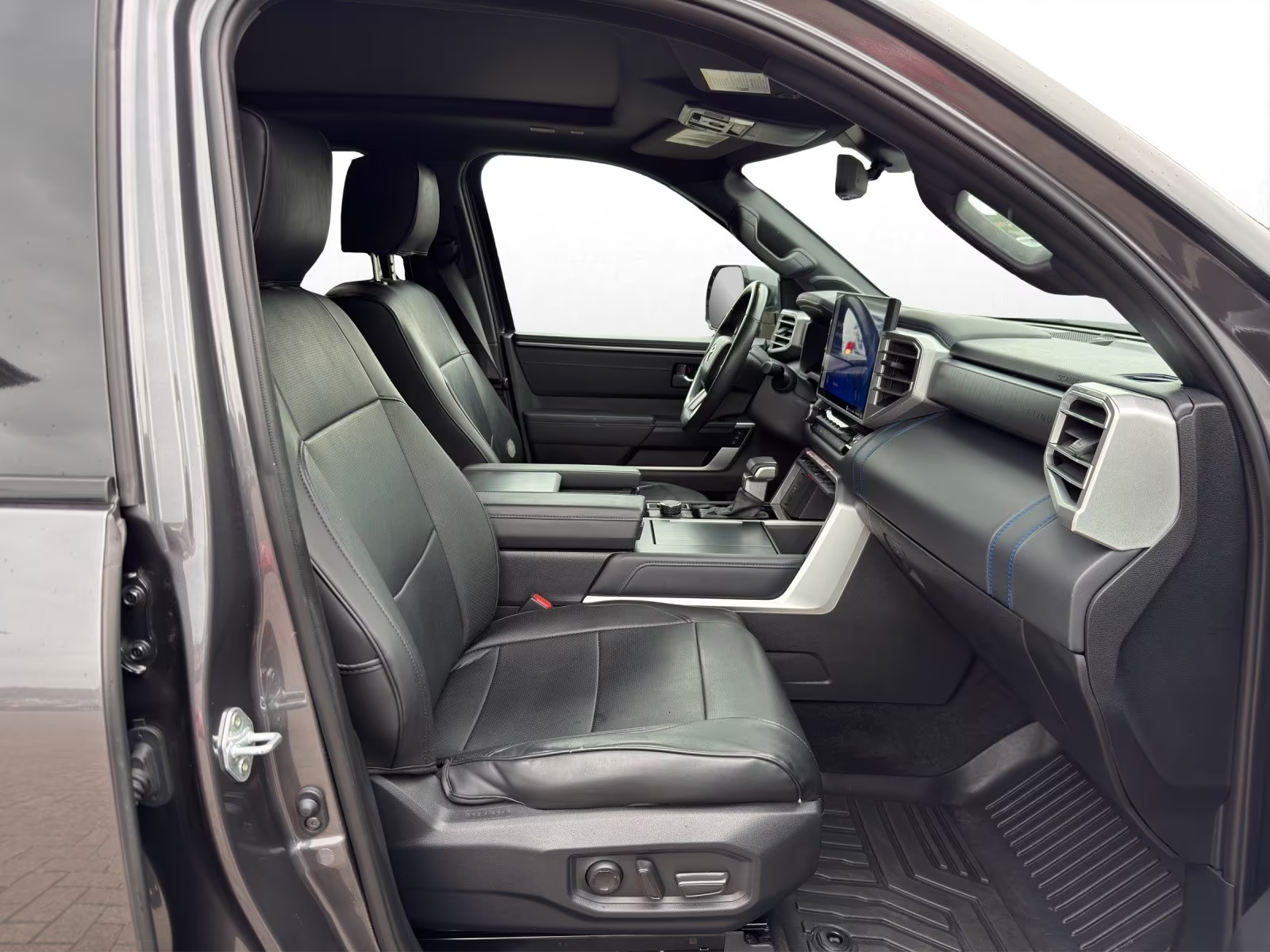 Passenger-side cabin view of the Toyota Tundra Platinum interior.