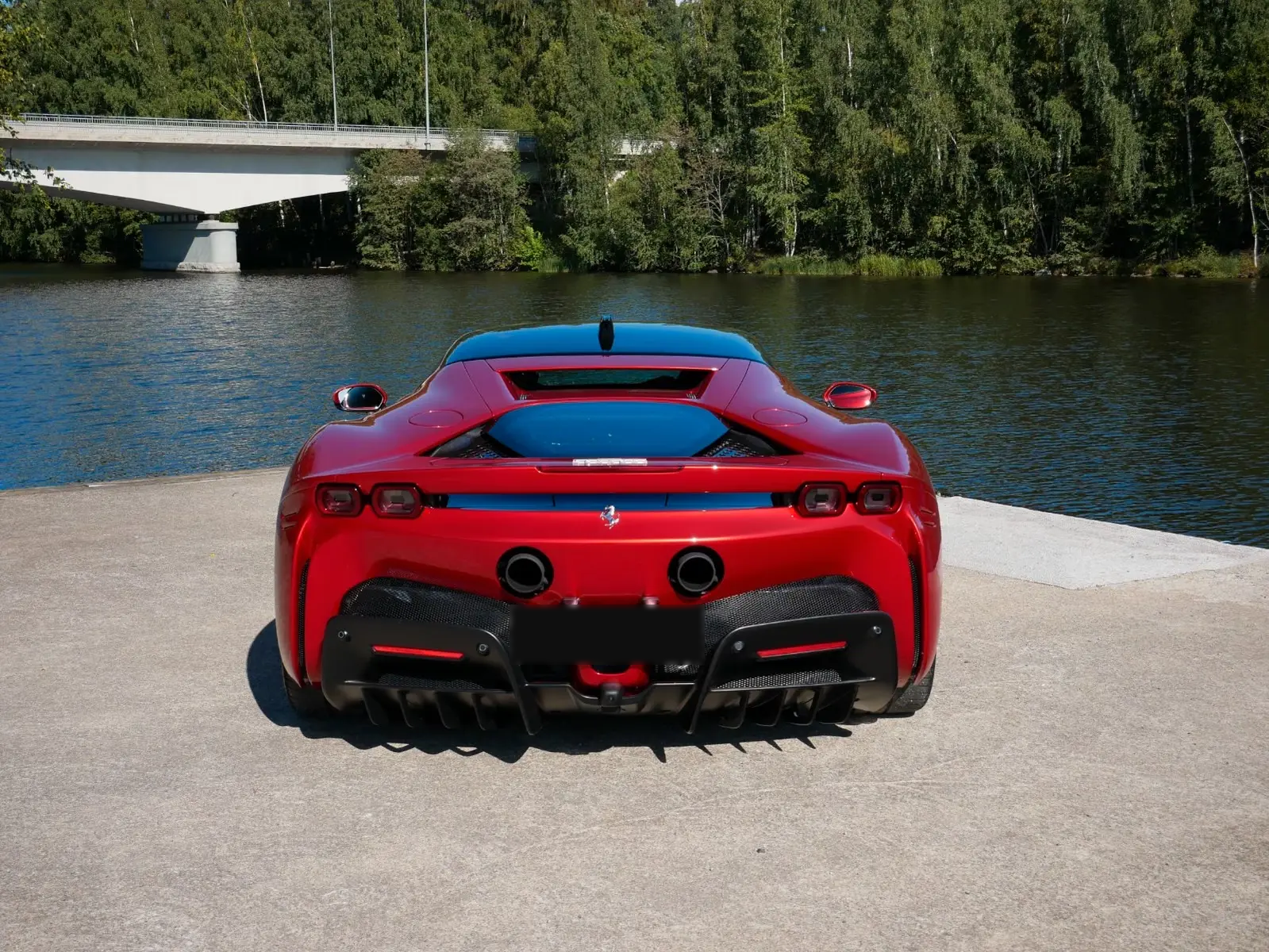 Ferrari SF90 Stradale 2022 — rear view with twin exhausts and Novitec tips
