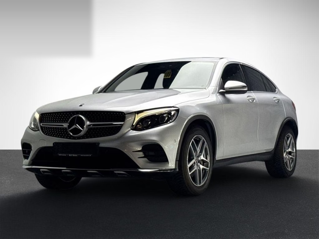 Mercedes-Benz GLC 300 Coupé in Iridium Silver metallic, front three-quarter view from the driver side.