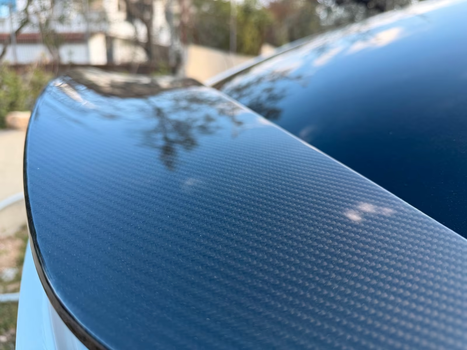 Close-up of the genuine carbon rear spoiler on the Tesla Model X.