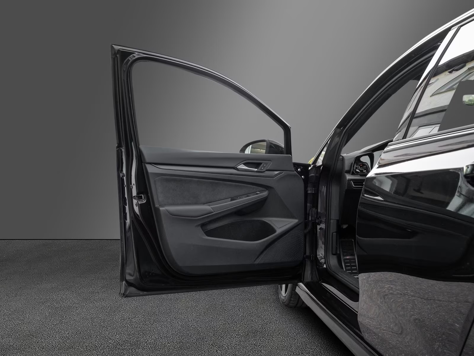 Open driver's door showing the Golf GTI Clubsport door trim.