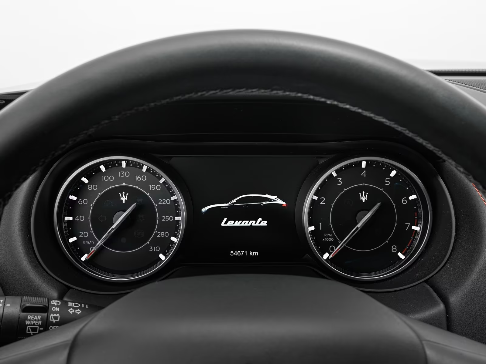 Instrument cluster of the Maserati Levante showing 54,671 km.