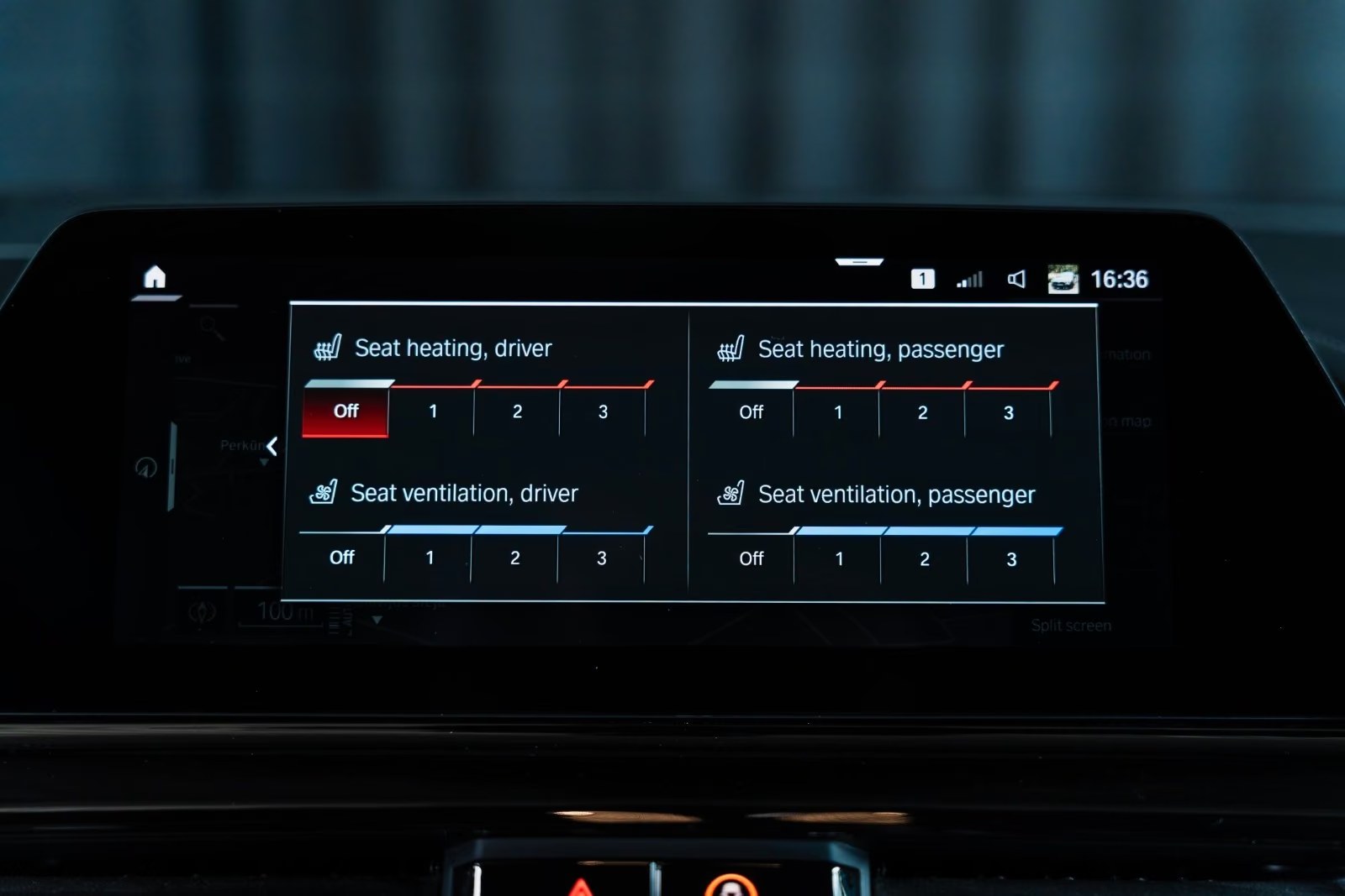Central display of the BMW M8 showing seat heating and seat ventilation settings.