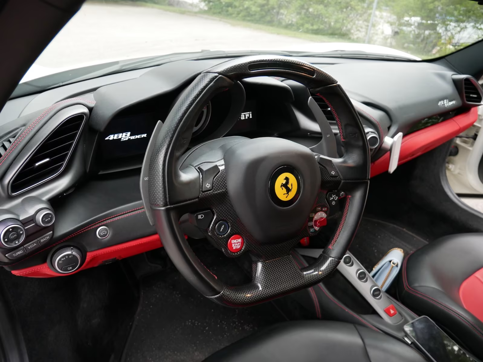 Ferrari 488 Spider Novitec 2017 — carbon-fibre steering wheel with LED shift lights