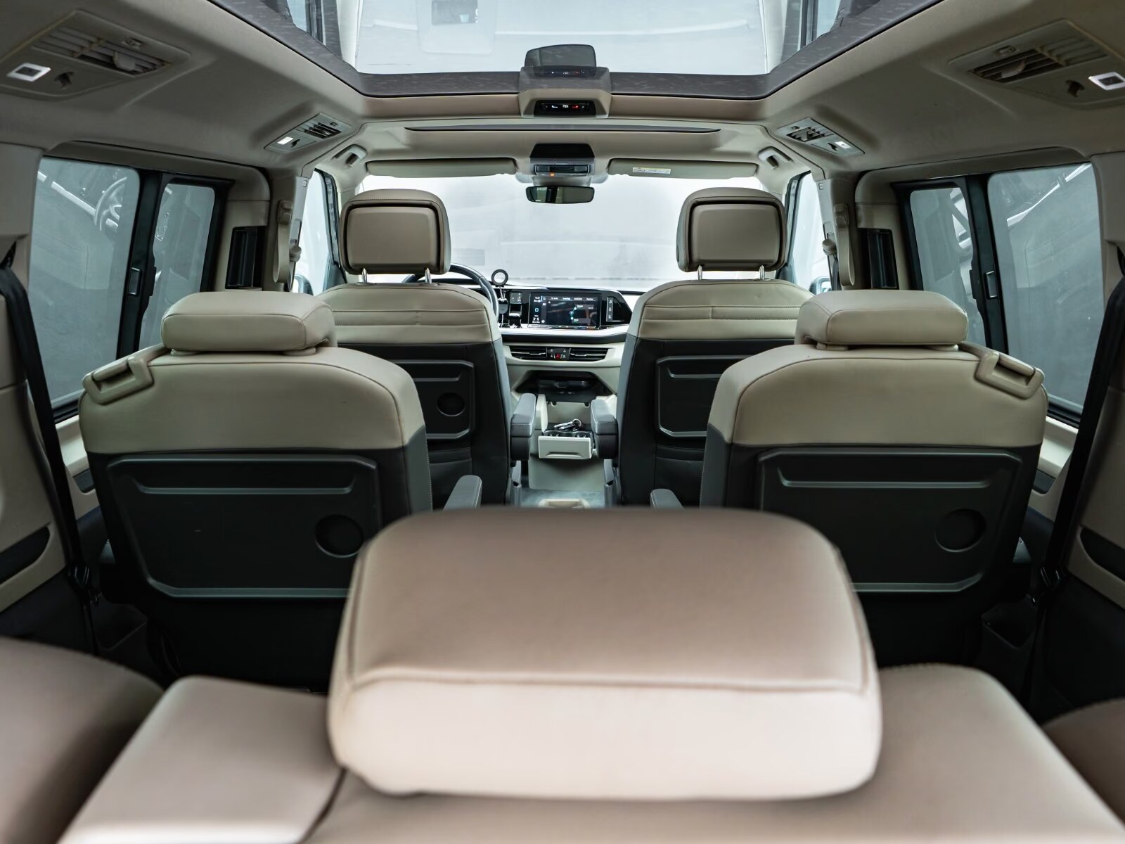 Cabin view of the T7 Multivan looking forward from the rear seats.