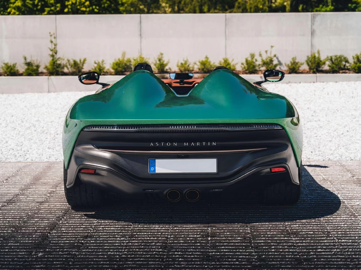 Rear view of the Aston Martin DBR22 showing the carbon diffuser and twin central exhaust outlets.