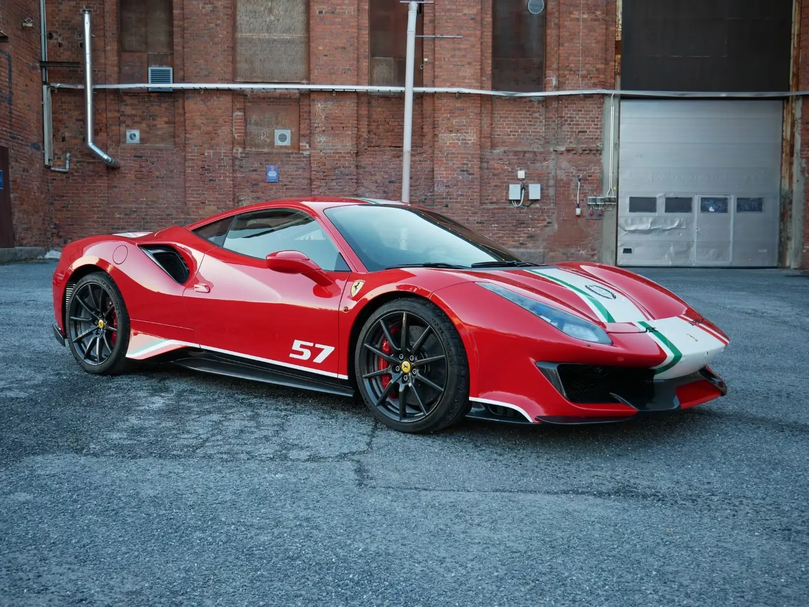 Ferrari 488 Pista Piloti #57 2019 in Rosso Corsa with tricolour livery — front three-quarter view
