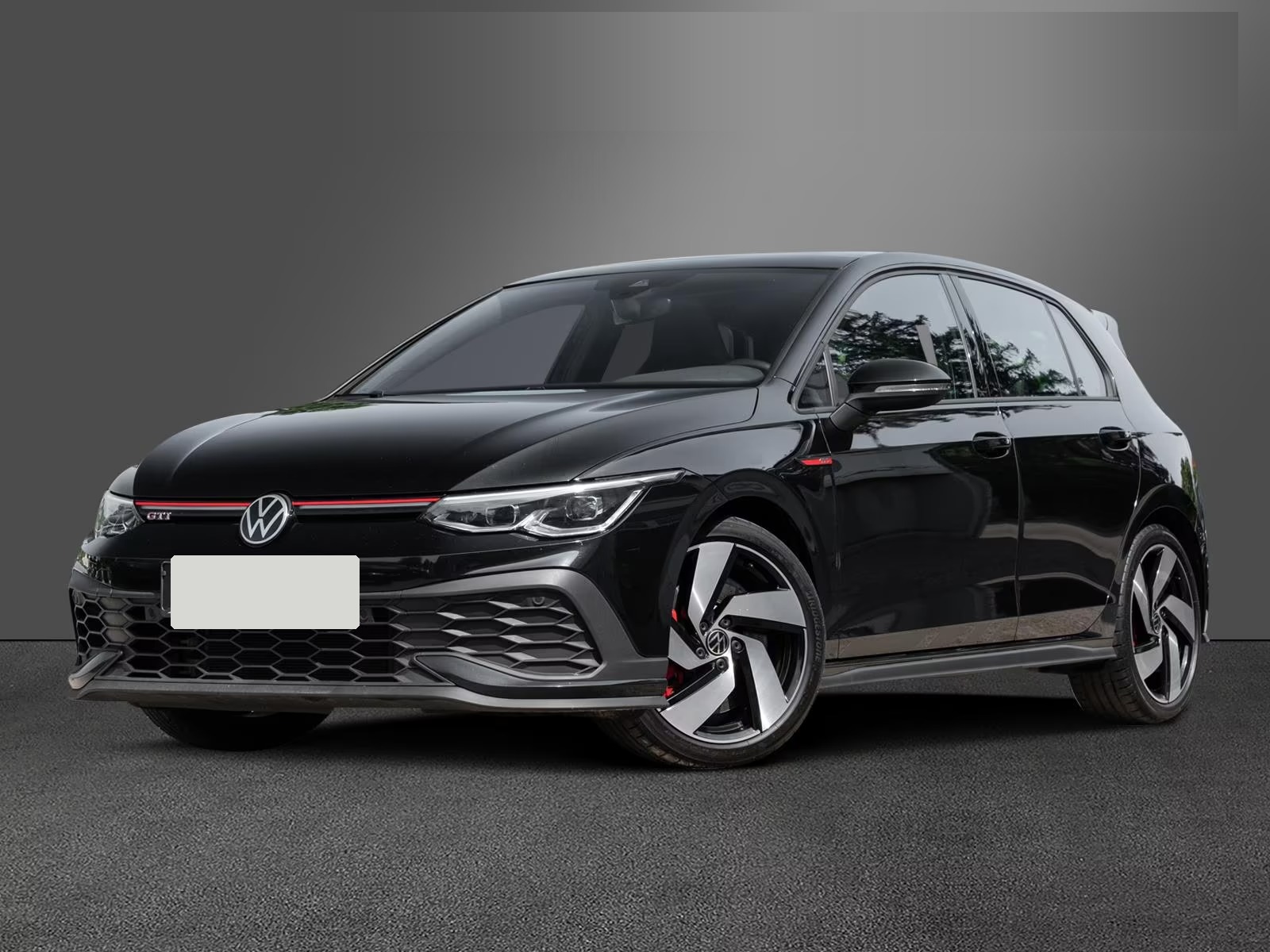 Black Volkswagen Golf GTI Clubsport in front three-quarter view with GTI grille stripe.