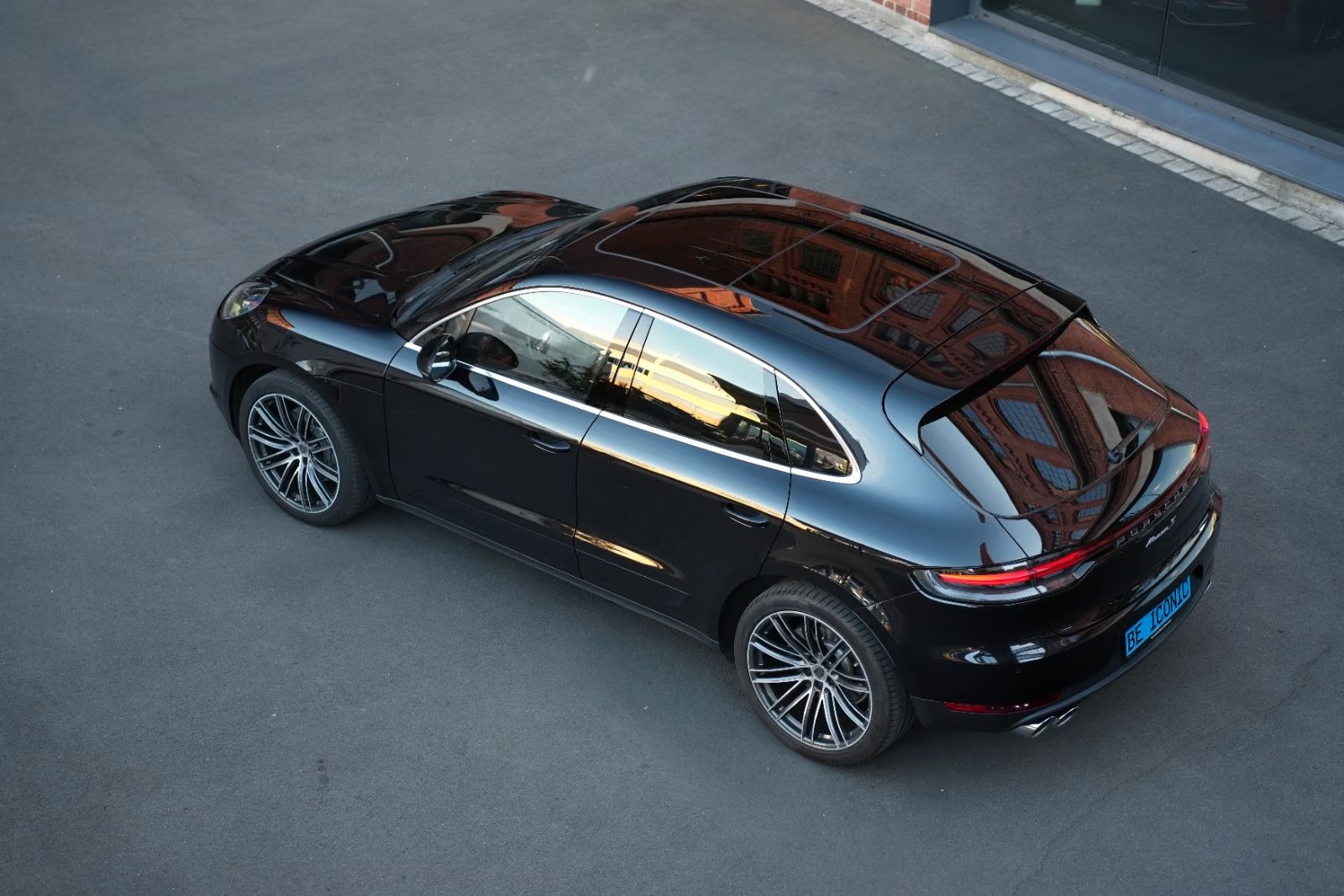 Porsche Macan S in black metallic, elevated side view