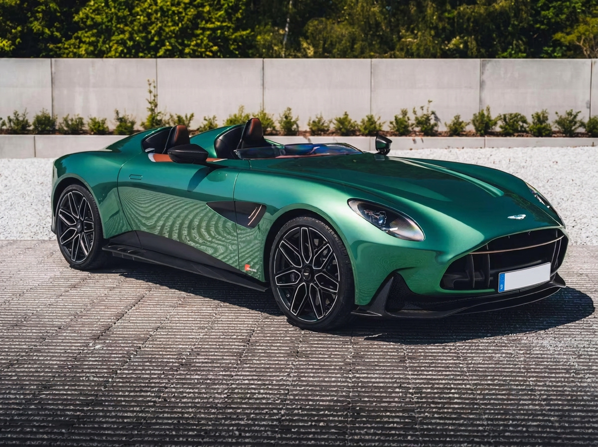 Aston Martin DBR22 in DBR22 Green, front three-quarter view on a gravel forecourt.