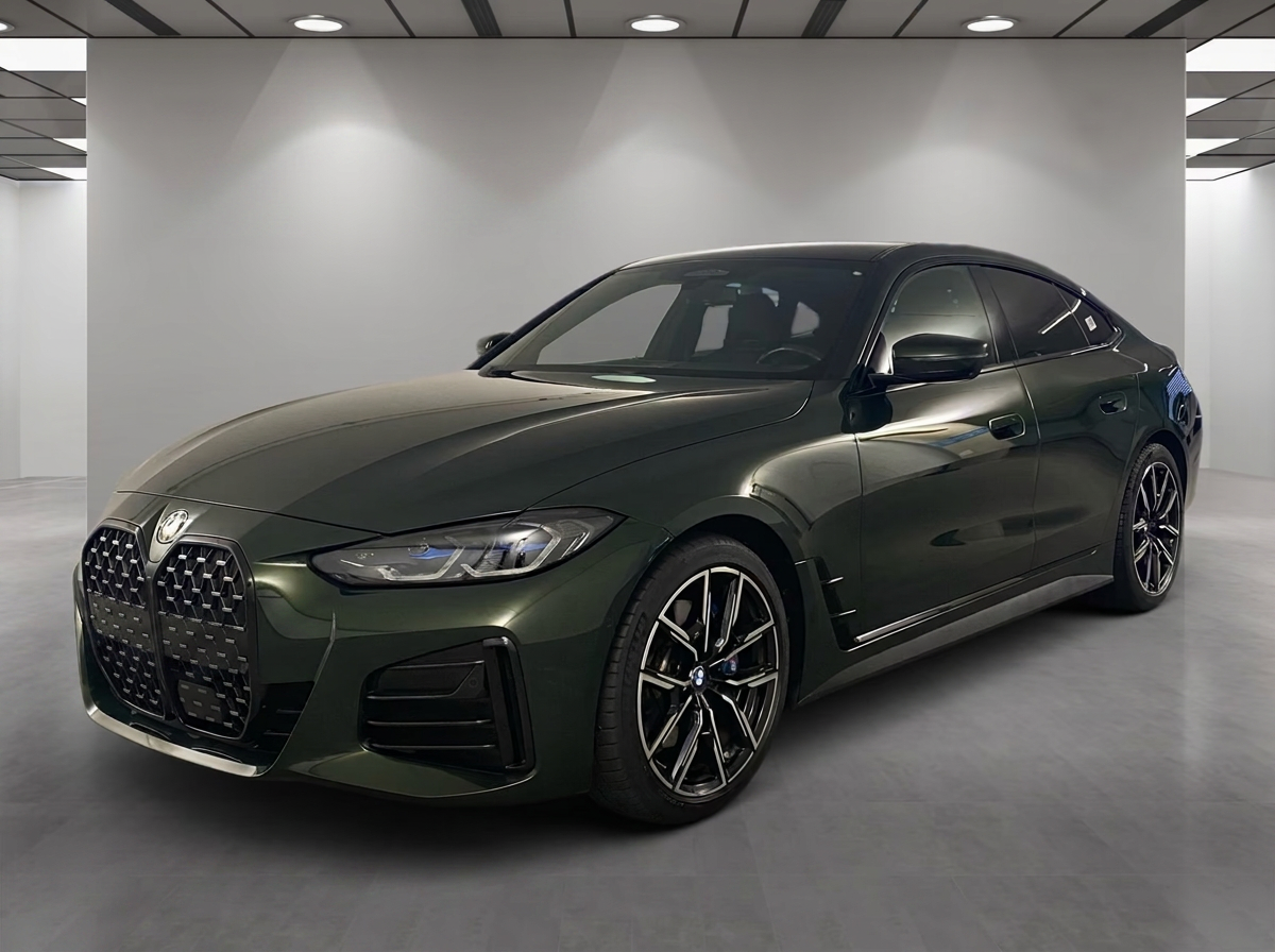 BMW 430i xDrive Gran Coupé 2023 in Sanremo Green — front three-quarter view