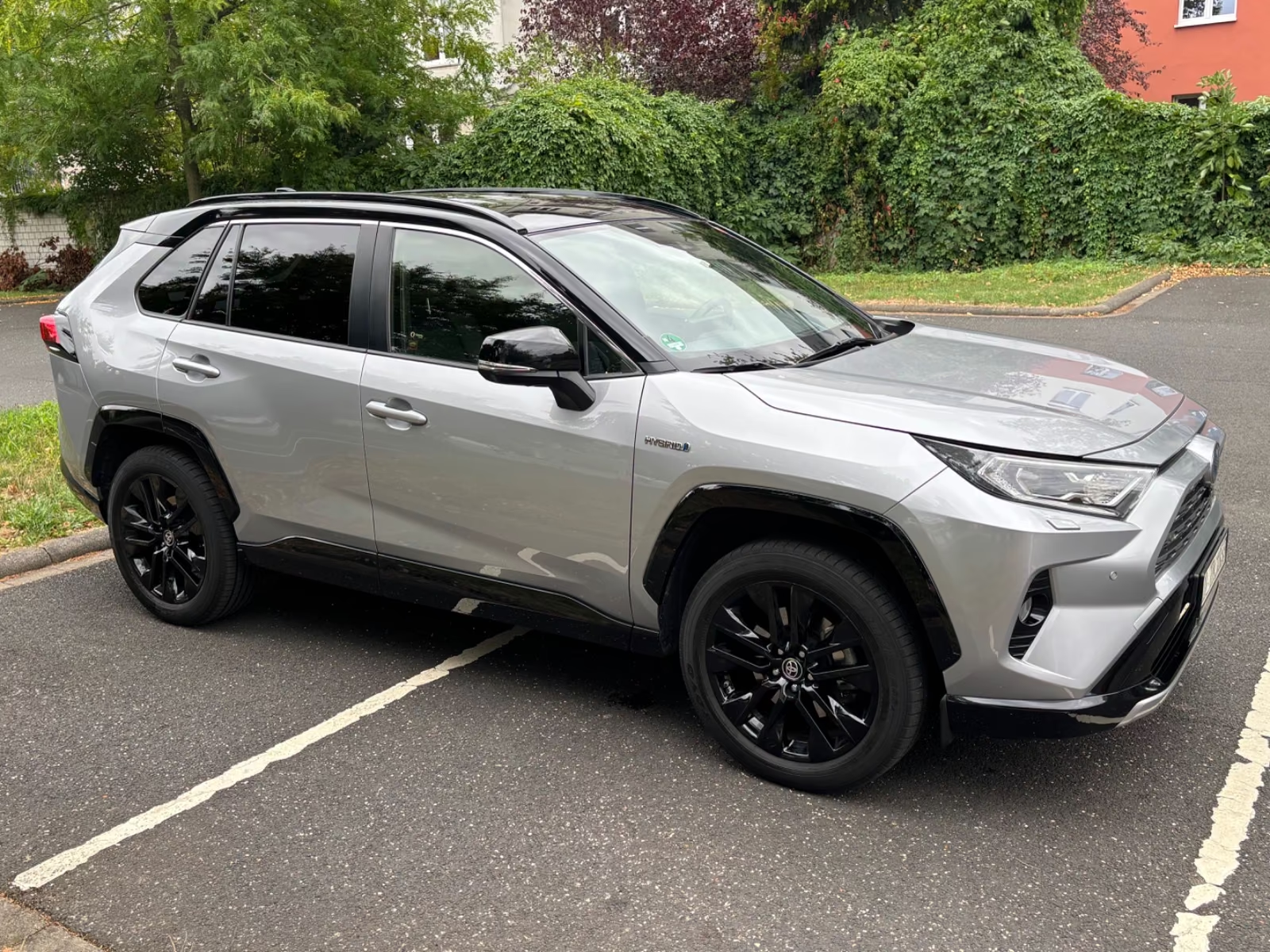 Front three-quarter view from the passenger side of the Toyota RAV4 Hybrid.