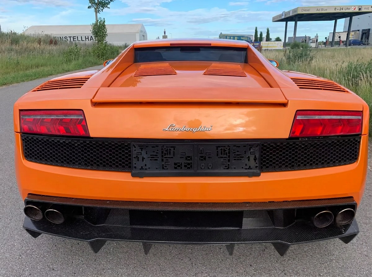 Rear view of the orange Lamborghini Gallardo with sport exhaust and diffuser