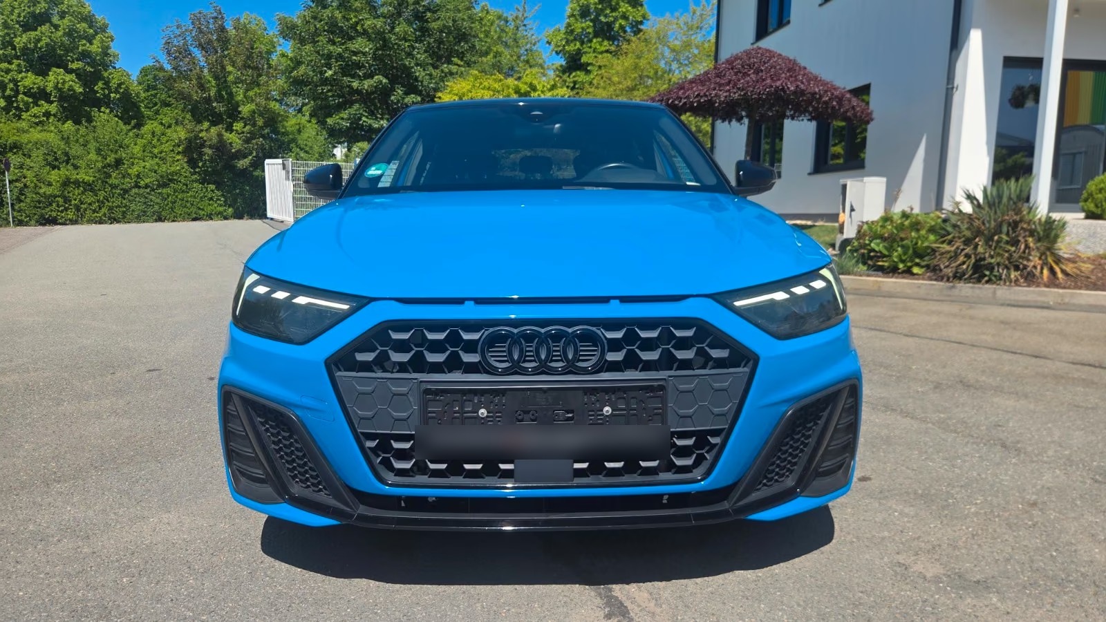 Front view of the Audi A1 Sportback showing the single-frame grille, LED headlights and front bumper.