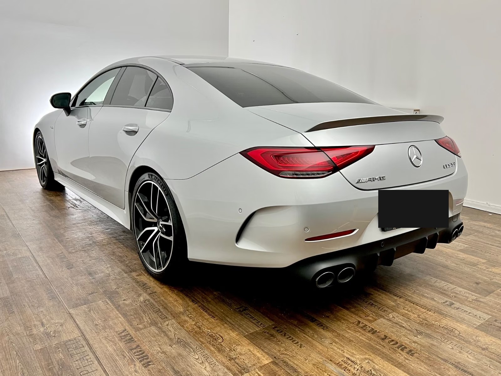 Mercedes-AMG CLS 53 4MATIC+ rear three-quarter view with quad exhausts