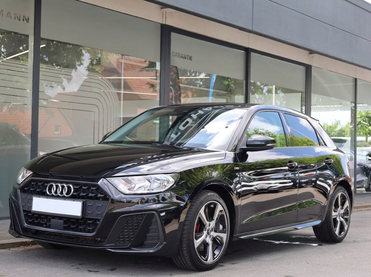 Low front three-quarter view showing the Audi A1 S line bodywork and alloy wheels.