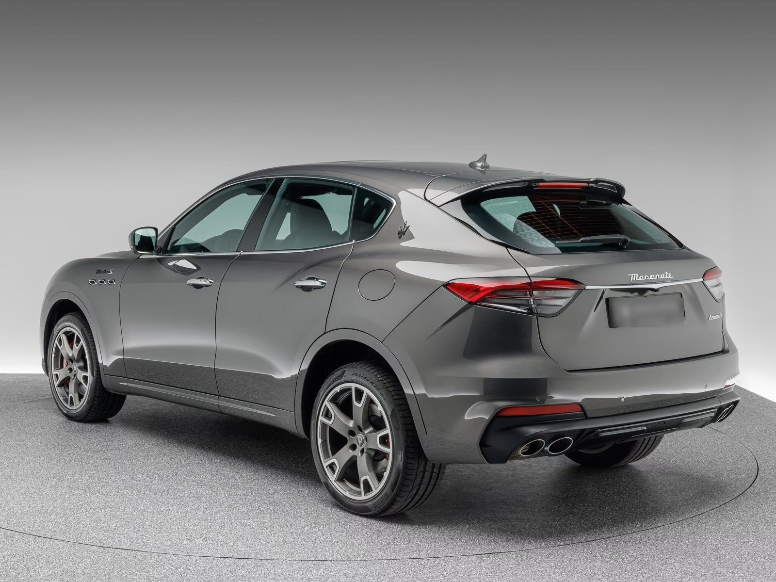 Rear three-quarter view of the Maserati Levante Modena S with quad exhaust tips.