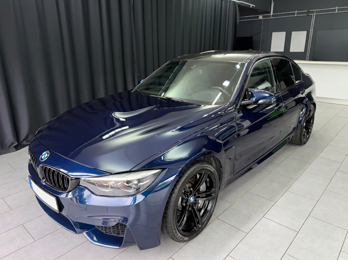 BMW M3 Competition F80 in Tanzanite Blue — front three-quarter view