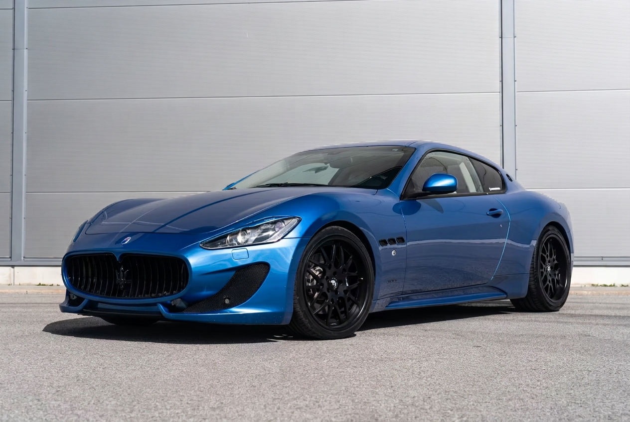 Front three-quarter view of the blue metallic Maserati GranTurismo Sport.