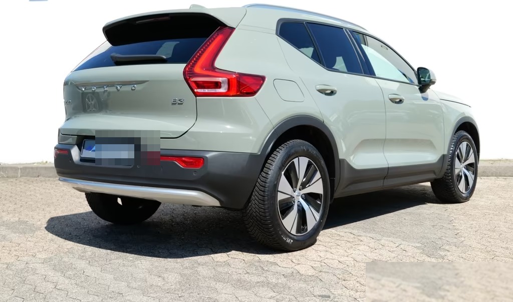 Rear three-quarter view of the Sage Green Volvo XC40