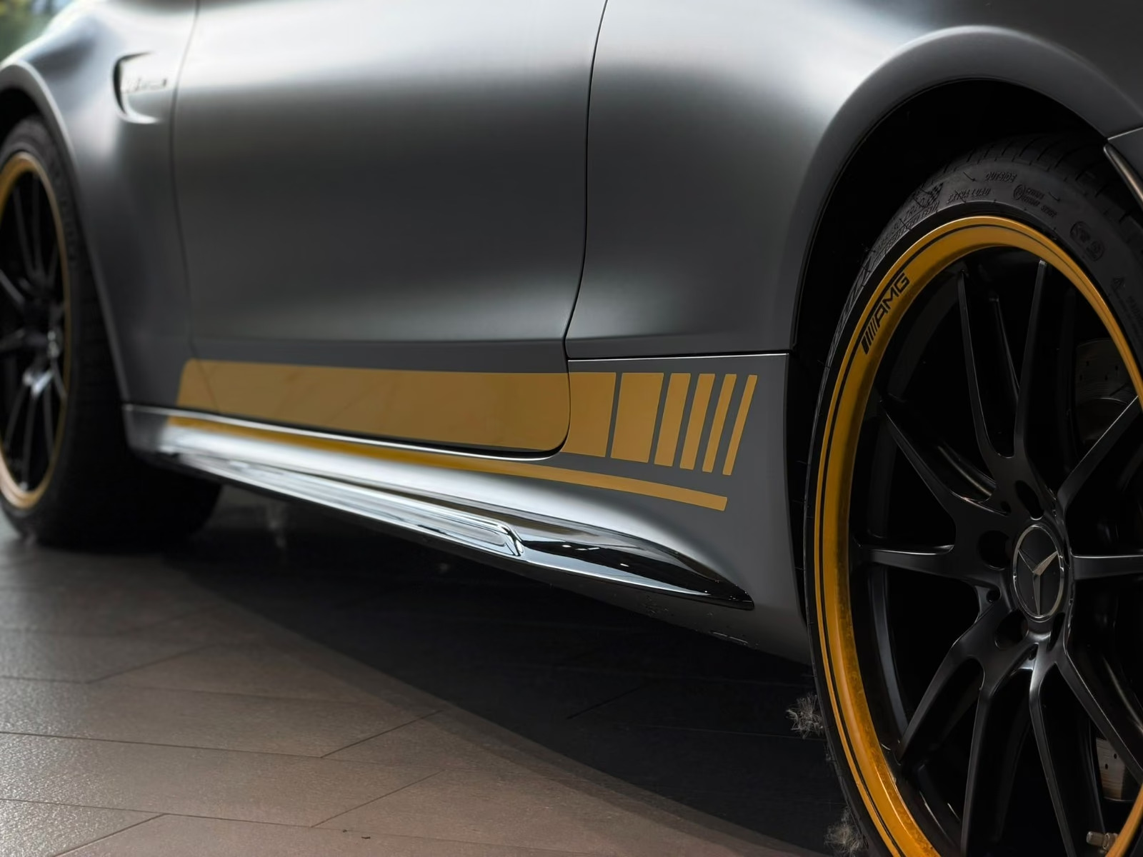 Mercedes-AMG C 63 S Coupé yellow side graphics and AMG wheel