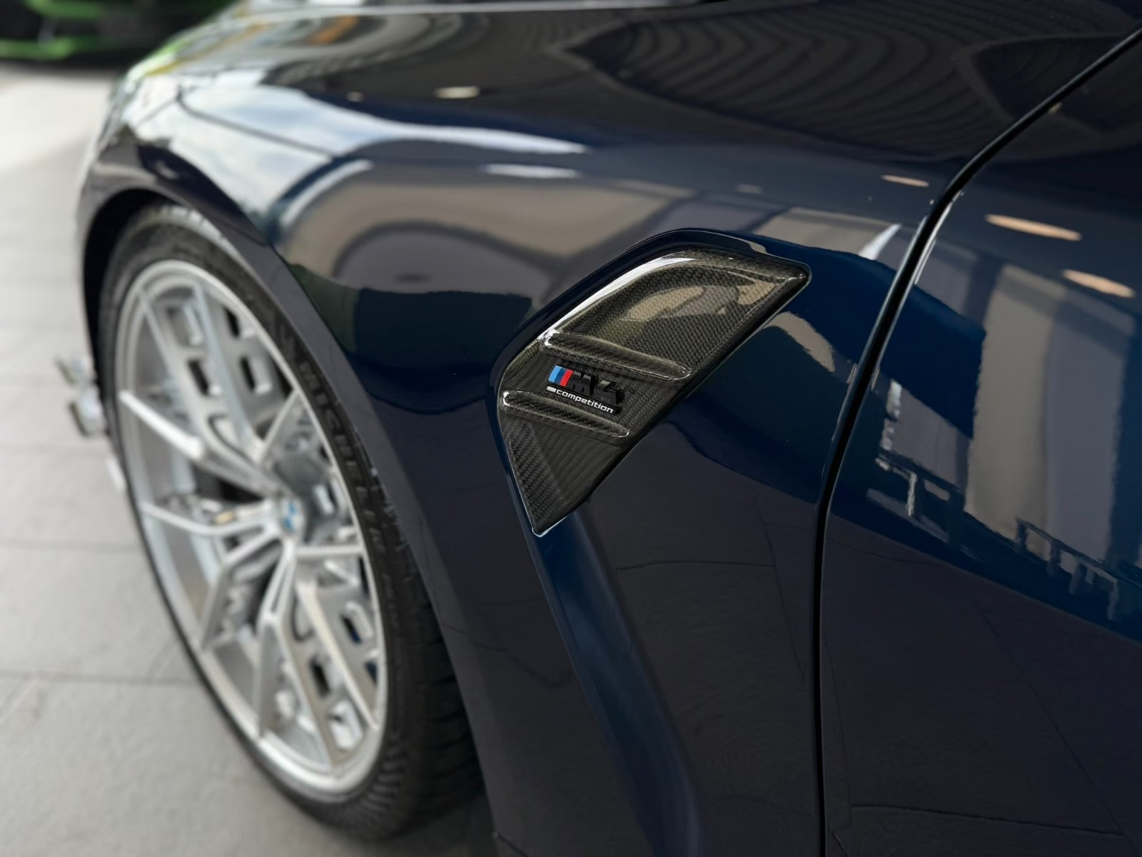 BMW M4 Competition — carbon front fender intake detail