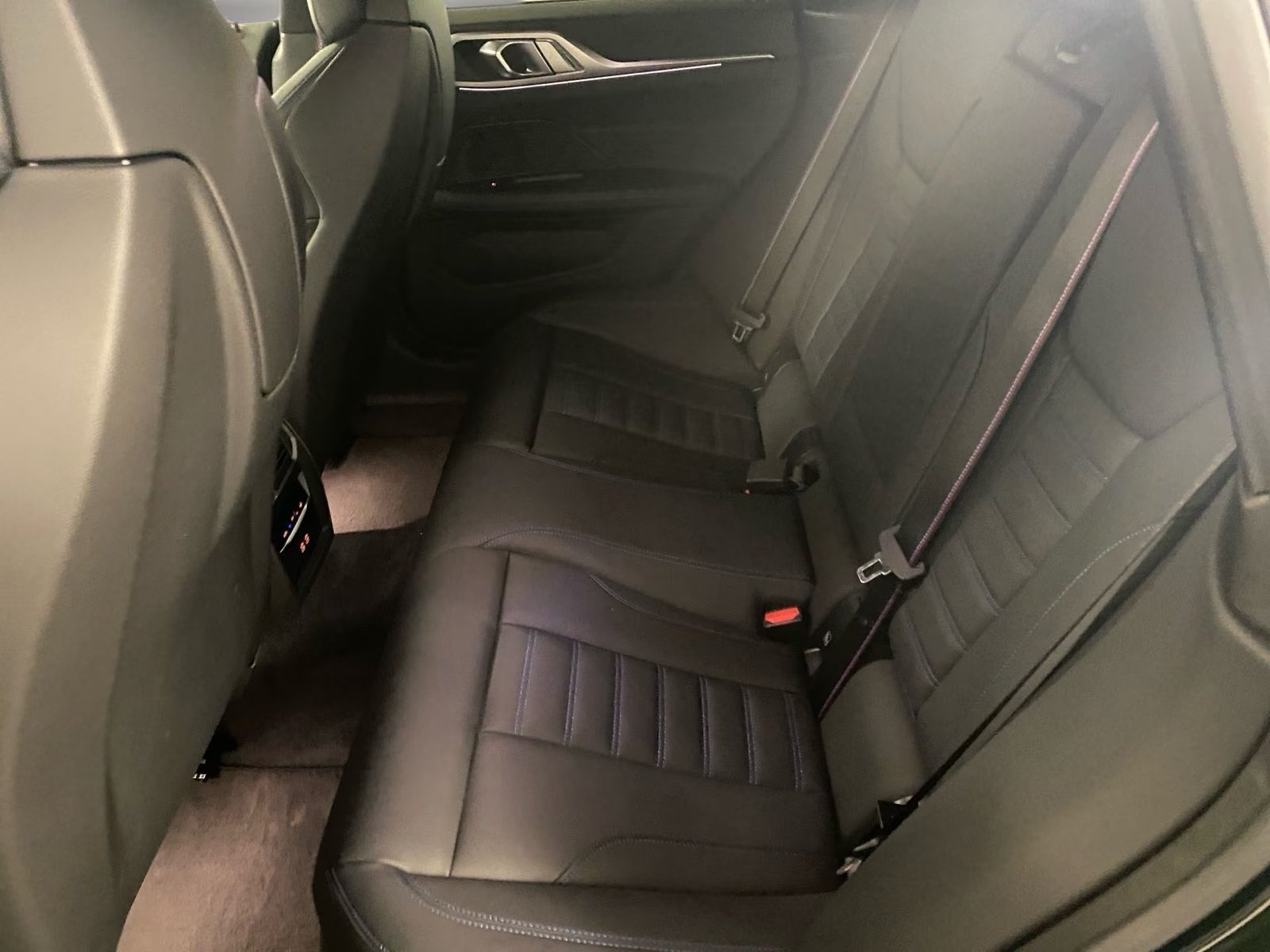 BMW 430i xDrive Gran Coupé 2023 — rear seats in black Vernasca leather