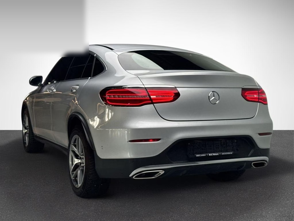 Rear view of the Mercedes-Benz GLC 300 Coupé showing the tailgate, rear lights and twin exhaust outlets.