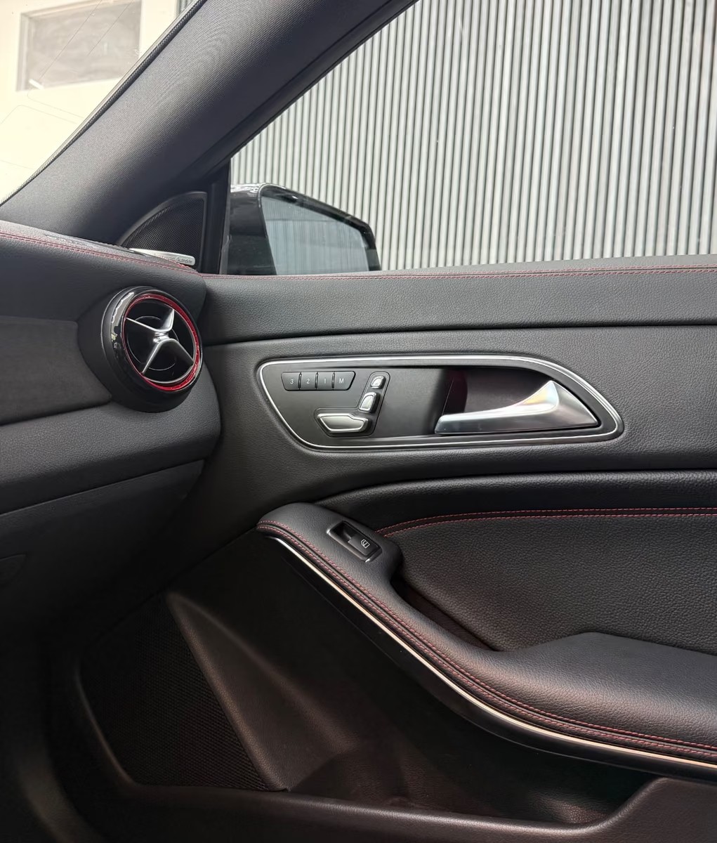Mercedes-AMG CLA 45 4MATIC door panel with memory seat controls