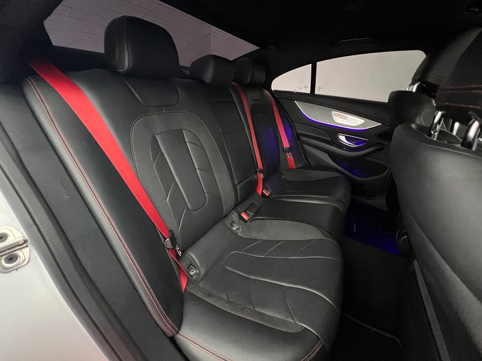 Mercedes-AMG CLS 53 4MATIC+ rear seats in black leather with red belts