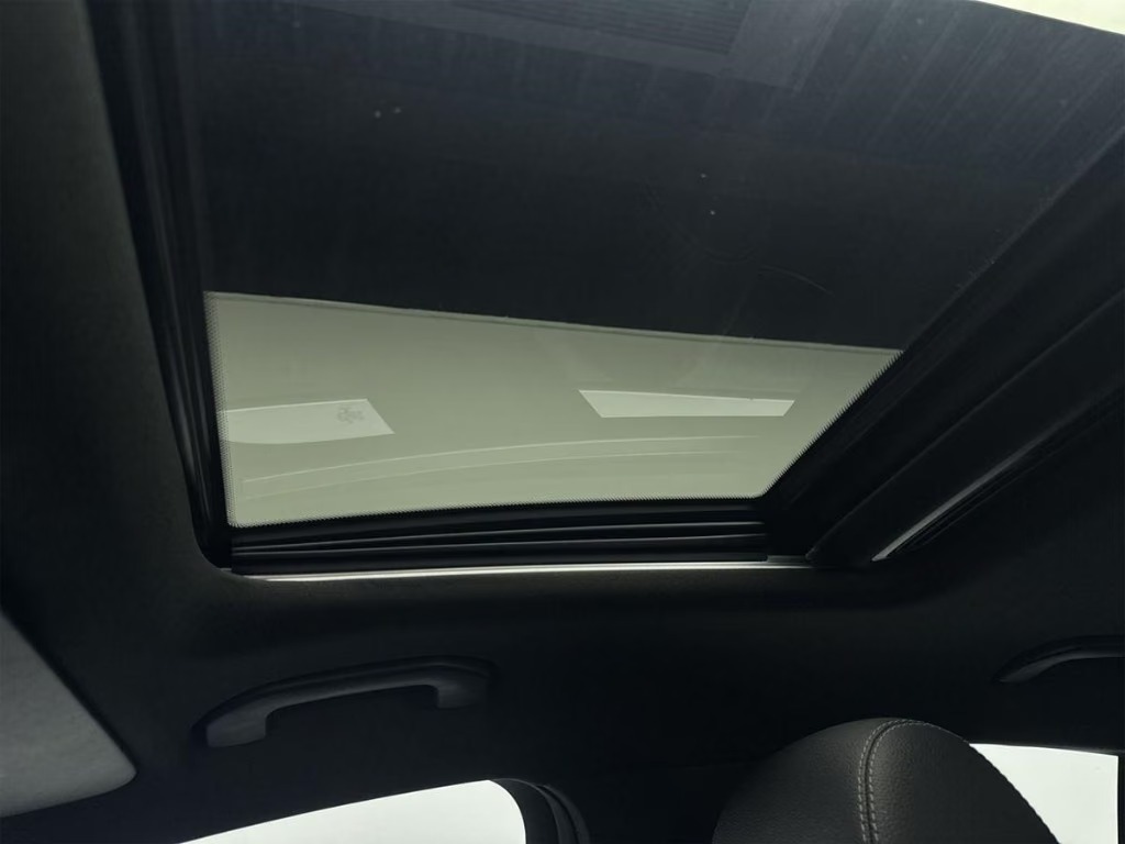 Interior roof of the Mercedes-Benz GLC showing the open panoramic glass sunroof.