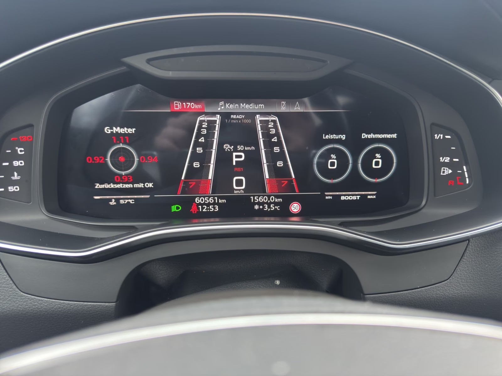 Audi RS7 digital instrument cluster showing 60,561 km and the RS performance display.