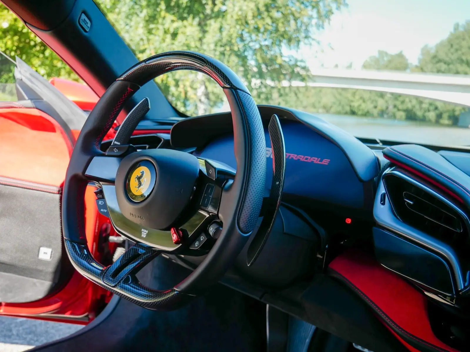 Ferrari SF90 Stradale 2022 — carbon steering wheel with LED shift lights
