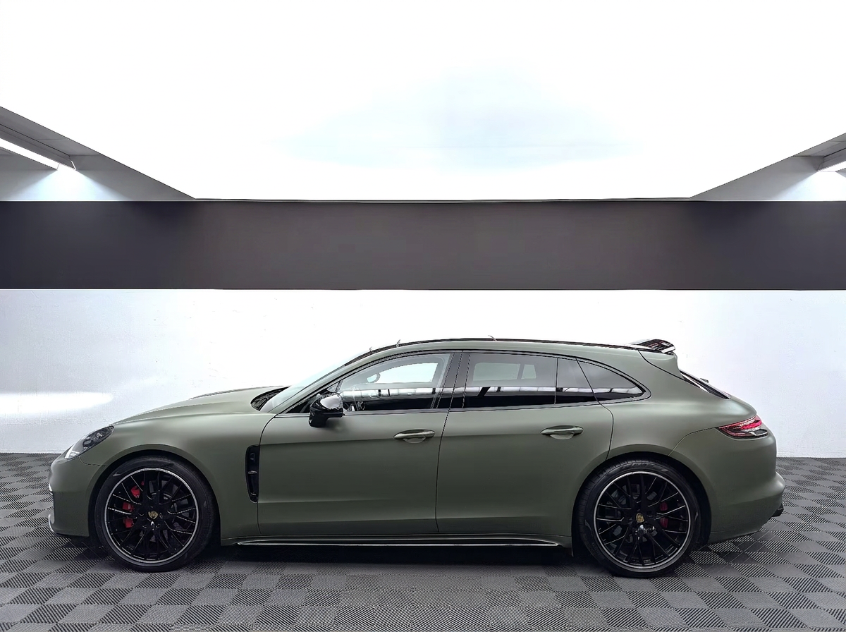 Porsche Panamera GTS in matte green, full side view