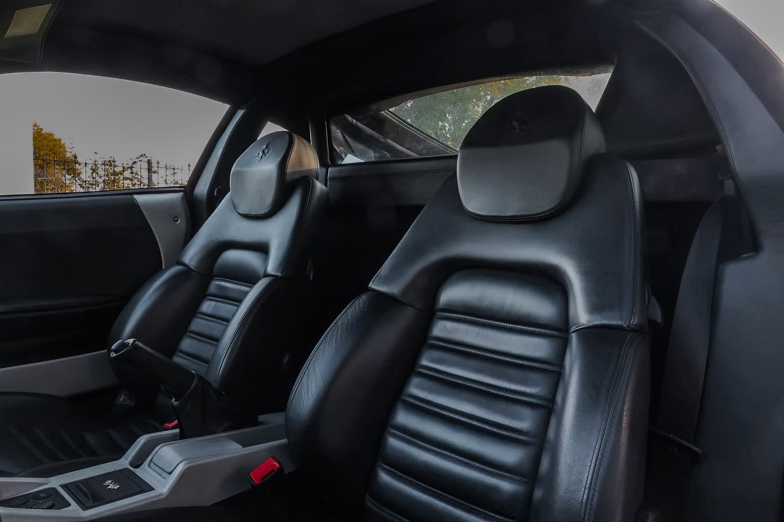 Ferrari 360 Modena 2001 — black leather sport seats